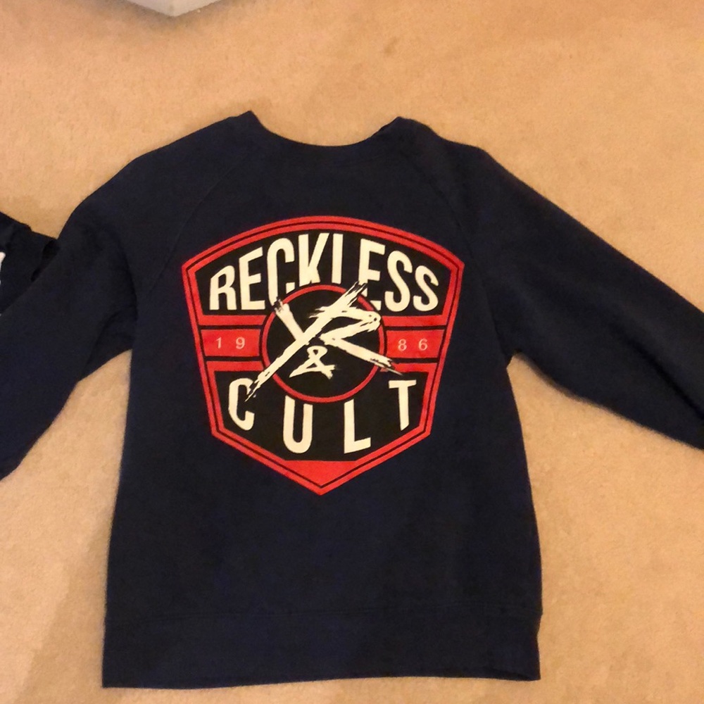 Young and Reckless sweater